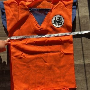 Gently used Goku costume. Only used for 3 hours. Make me an offer